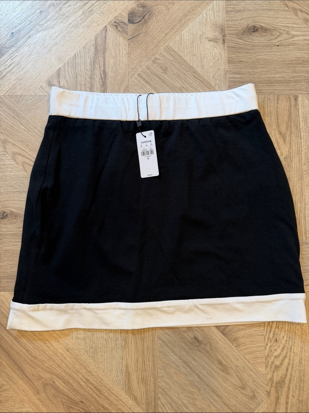Express Black Mini Skirt with Ivory Waist and Hem